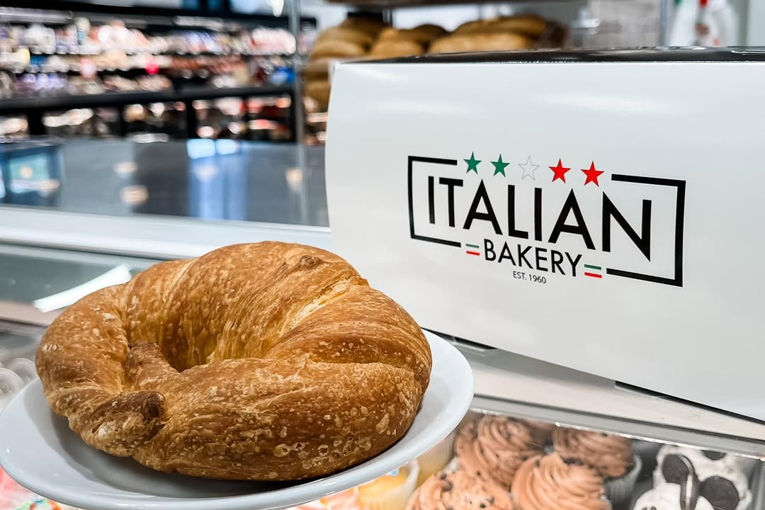 Shot of Italian Bakery-branded box and shop interior