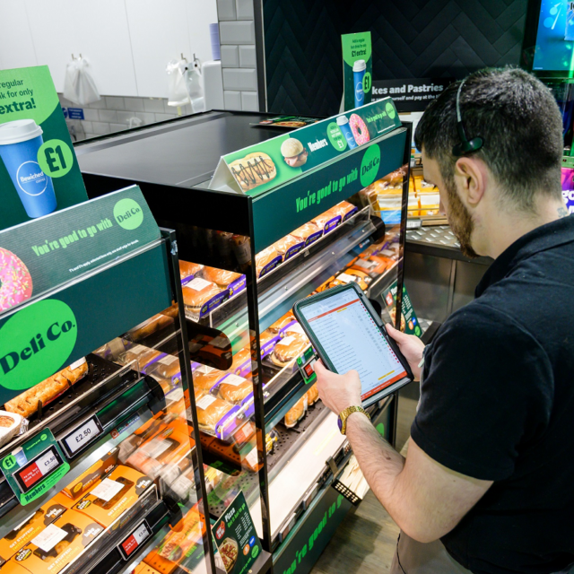 Photo of store colleague using Cybake ISB at at Heart of England Co-operative’s store in Lower Heathcote, Coventry